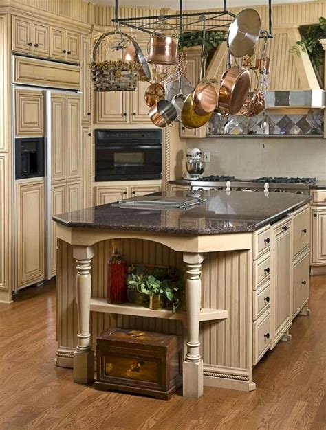 Country galley kitchen in sydney with an undermount sink, shaker cabinets, white cabinets, white splashback, subway tile splashback, stainless steel appliances, medium hardwood floors, with island, brown floor and white benchtop. Stunning French Country Kitchen Cabinets Cream (51) #FrenchCountryDecor | Country kitchen ...