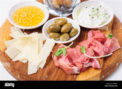 Assorted Cheeses Wallnuts And Other Snacks Stock Photo Alamy
