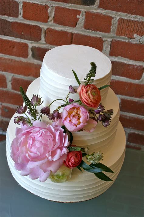 Simple Buttercream Wedding Cake With Farm Girl Flowers Cake Bloom