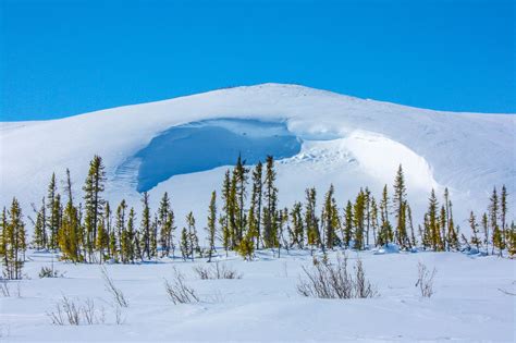 A Massive Snowdrift In The Remote Canadian Tundra Northwest