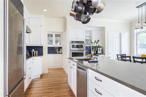 Others to pass by the kitchen without interrupting cooking. L-Shaped Kitchen Remodel Keeps Layout, Swaps Old for New - Model Remodel