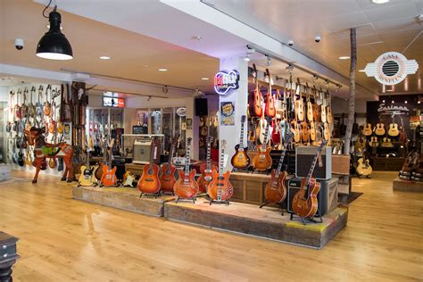 Max Guitar - It's Playtime! - Max Guitar | Music store design, Guitar store, Guitar