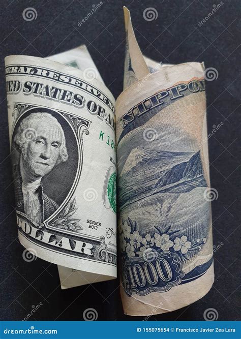 American One Dollar Bill and Japanese Banknote of 1000 Yen Stock Photo