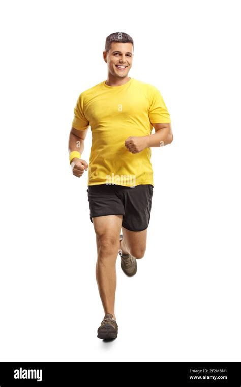 Full Length Portrait Of A Young Man In Sportswear Running Towards