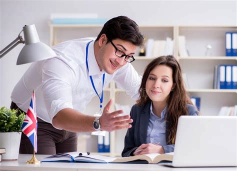 Teacher Explaining To Student At Language Training Stock Image Image