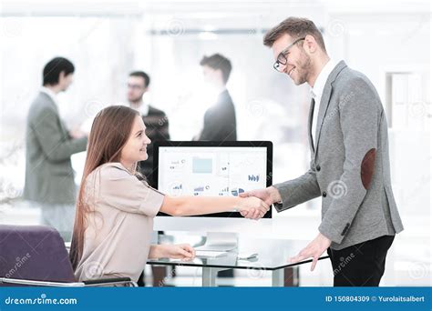 Manager And Employee Shaking Hands To Each Other As A Sign Of Success