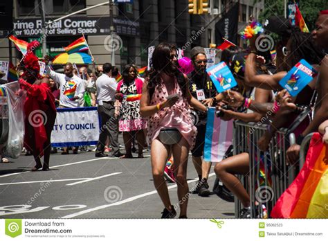 manhattan new york june 2017 person in pink costume in the gay pride parade and audiences on