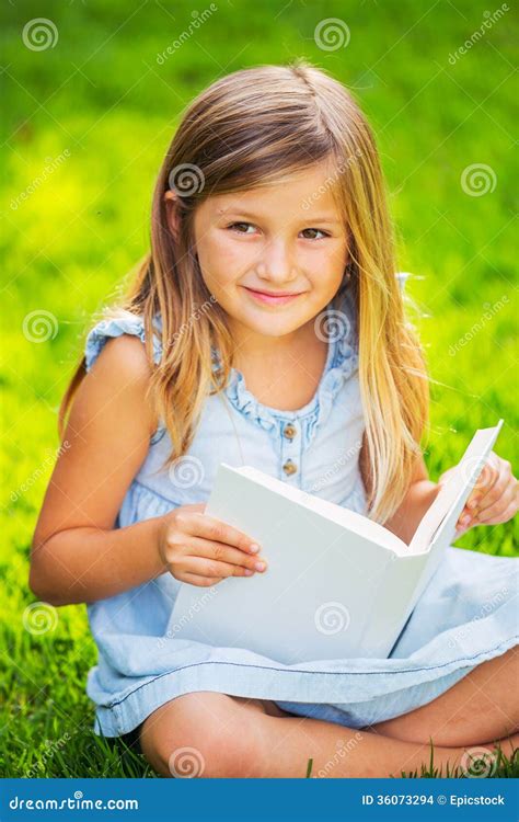 Little Girl Reading Book Outside Stock Photo Image Of Meadow Baby