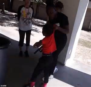 horrifying moment a mother beats her son 7 with a belt and threatens to break his face for