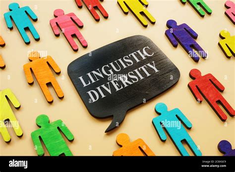 Linguistic Diverse phrase and colorful wooden figures Stock Photo - Alamy