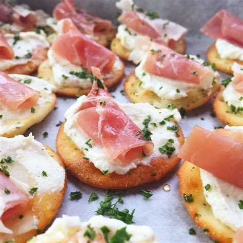 More than 230 recipes for top christmas appetizers like spiced nuts, dips, spreads, and snack mix. Ricotta and Prosciutto Cracker Appetizer - Seasonly Creations