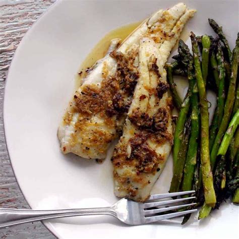 Grill, turning and basting occasionally, for 10 minutes per inch of thickness or until fish is flaky and no longer translucent in the center. Flounder and Asparagus with Fresh Lemon Pepper | Recipe | Flounder recipes healthy, Stuffed ...