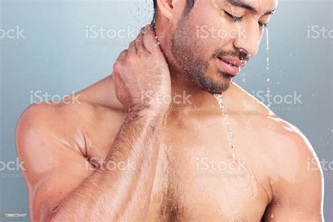 Mixed Race Man Rubbing His Neck In Pain While Taking Shower Young Man
