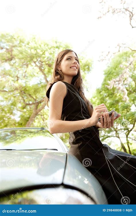Businesswoman Leaning On Car With Smartphone Stock Photo Image Of