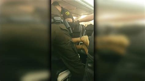 disruptive airline passenger forcefully removed from plane fox news video