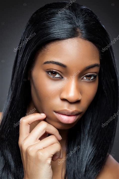 Black Beauty With Perfect Skin Stock Photo By ©tommyandone 40050453