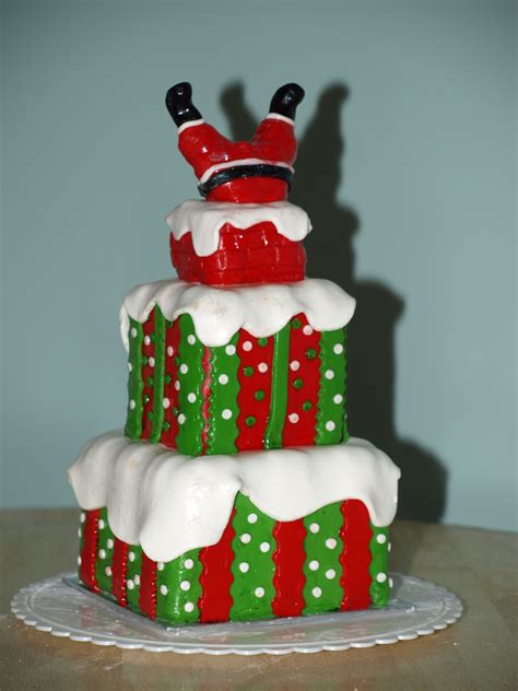 It is made of sugar, corn syrup and water and can be colored and. Christmas Fondant cake...banana loaf cake with fondant icing and Santa of course | Christmas ...