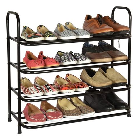 Four Tiered Shoe Rack With Multiple Pairs Of Shoes