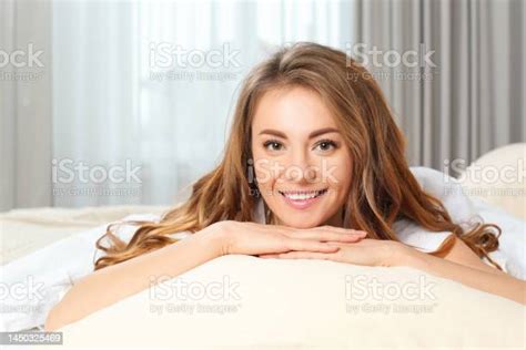 Portrait Of Happy Beautiful Woman In Bed At Home Stock Photo Download