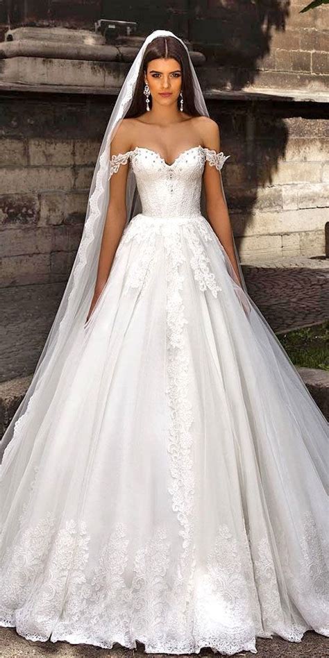 Many classic wedding dress designers will create updated versions of patterns that could have been worn decades bride & bridesmaids how to get the wedding dress shopping experience amidst the. Designer Highlight: Crystal Design Wedding Dresses ...