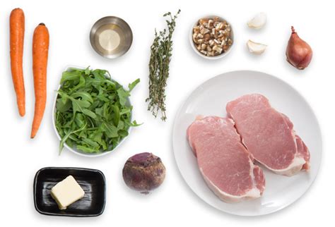 Wrap each pork chop in uncooked bacon slices (the number will vary depending on how large the pork chops are). Recipe: Center-Cut Pork Chops with Warm Beet, Carrot ...