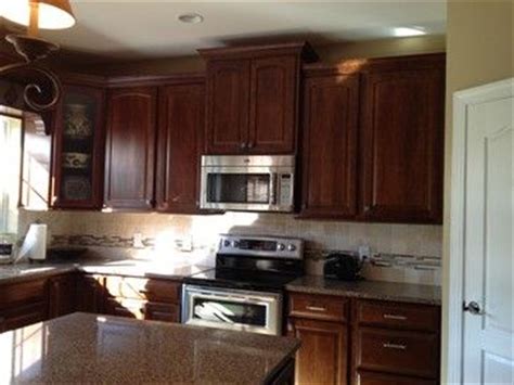 This page is about kraftmaid kitchen cabinets cognac,contains kraftmaid mandolay cherry,kraftmaid amhurst oak cognac desk & breakroom,kraftmaid maple cognac with cianthus granite.,kraftmaid 15x15 in. kraftmaid cognac cabinets | Kraftmaid Montclair Cherry ...