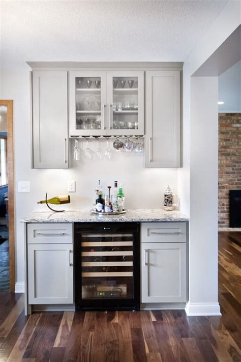 Above i would build some shelves that could be used for hanging wine glasses and storage for bottles and other glass ware. 37 Incredible Home Bar Designs (Wet and Dry)