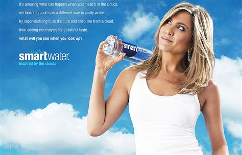 Jennifer Aniston New Smartwater Ad White Tank And Blue Jeans Picture