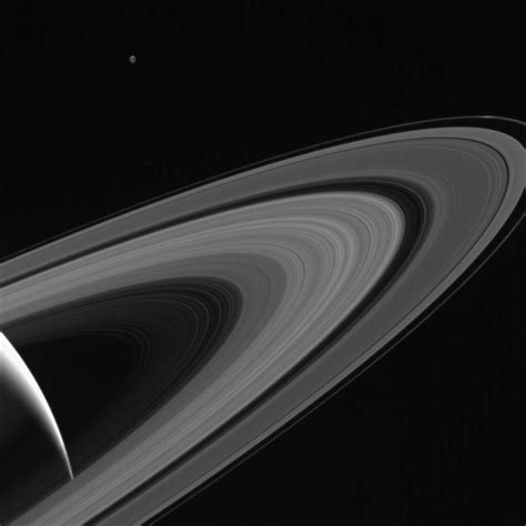 Nasas Cassini Spacecraft Views A Saturn Lit Tethys