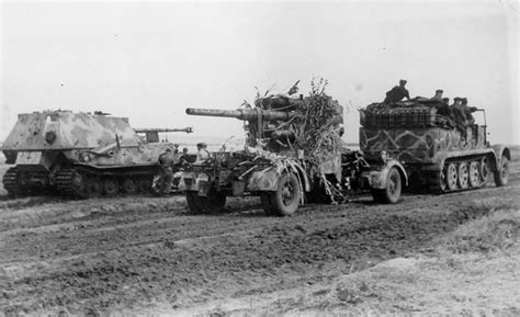 A Sdkfz7 Towing An 88mm Flak 36 Or 37 Passes A Halted Pa Flickr