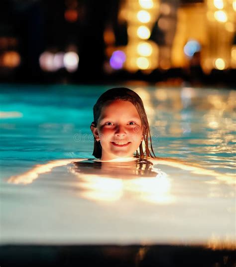 Girl In Swimming Pool At Night Stock Photo Image Of Kids Resort