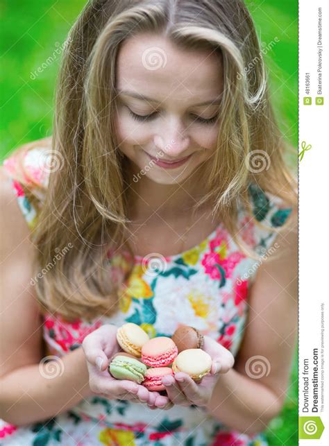 Young Girl Holding French Macaroons In Hands Stock Image Image Of Summer Dress 48163661