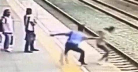 Caught On Camera Heroic Rail Worker Saves Suicidal Woman From Jumping In Front Of Train