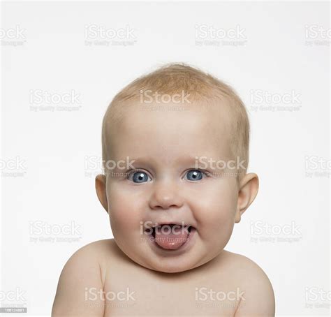 Baby Sticking Tongue Out Smiling Stock Photo Download Image Now 6