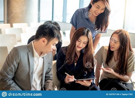Asian Colleagues Discussing In Conference Room Stock Photo Image Of