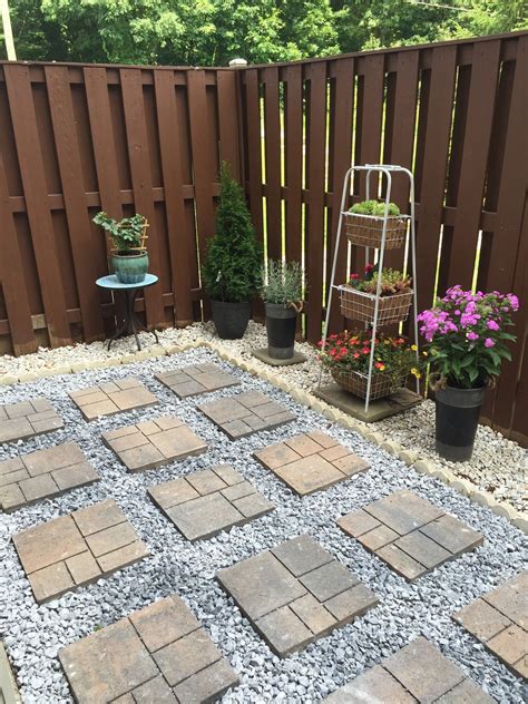 Part Of Our Patio Makeover How To Lay A Concrete Paver Rock Garden