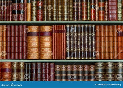 Old Library Of Vintage Hard Cover Books On Shelves Stock Photography