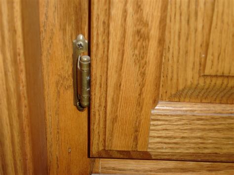 Replacing cabinet hinges with hidden ones. Kitchen Makeover - I love you paint!!! - Crazy Wonderful