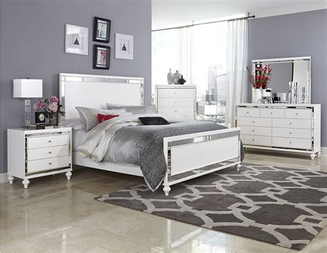 The pieces are a bed frame with a headboard, a nightstand cottage: 4-Pc Homelegance Alonza Beveled Mirror Frame Bedroom Set
