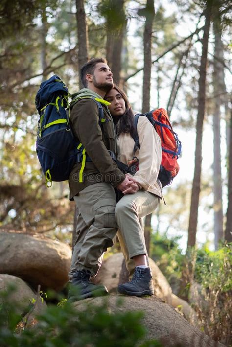 Content Couple Hiking In Forest In Autumn Stock Image Image Of