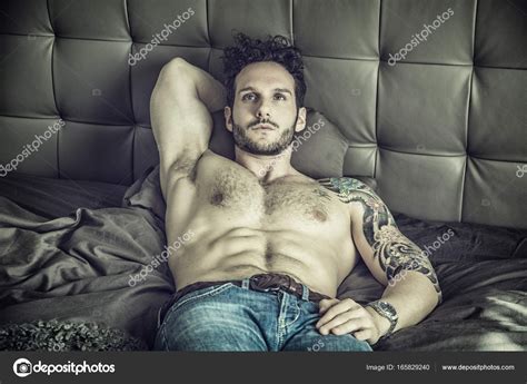 Shirtless Sexy Male Model Lying Alone On His Bed Stock Photo By