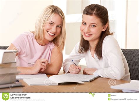 Student Series Two Friends Studying Together Stock