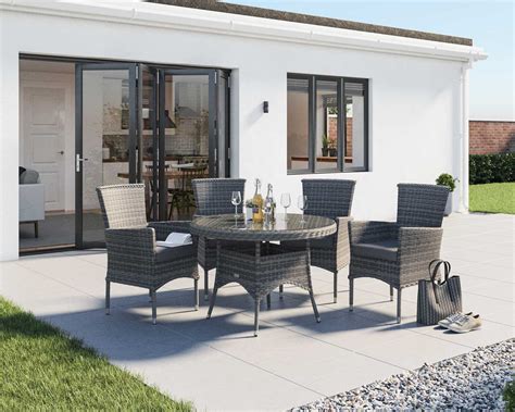 Using a uv treated weave, our furniture is happy in the harshest sunlight and the coldest winters. 4 Rattan Garden Chairs & Small Round Dining Table Set in ...