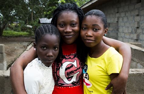 Liberia Georgia Hugs Her Daughters Stella And Emelda