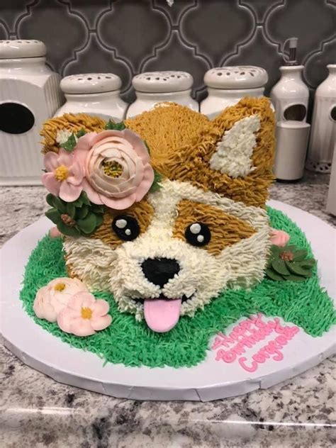 There Is A Cake Made To Look Like A Corgi With Flowers On It