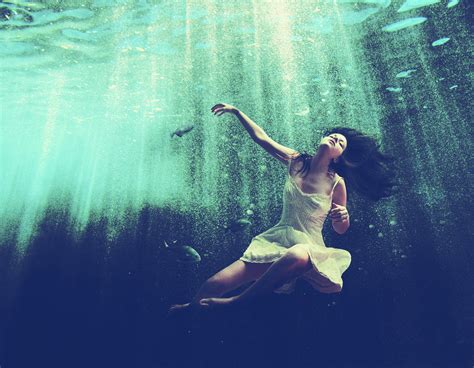 It is possible to drown (that is experience asphyxiation due to inhalation of water) in very shallow water indeed. Wallpaper : lights, women, sea, water, legs, dress, fish ...