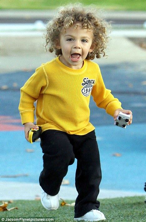 Kendra Wilkinson S Curly Haired Cutie Hank Iv Tears Around The Park
