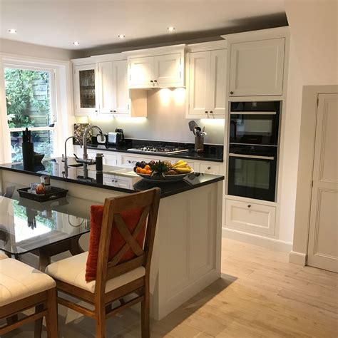 If you are having lighting underneath your wall units though then pelmet would do a really good. These double beaded cabinets, with traditional cornices, planted plinths and kitchen island ...