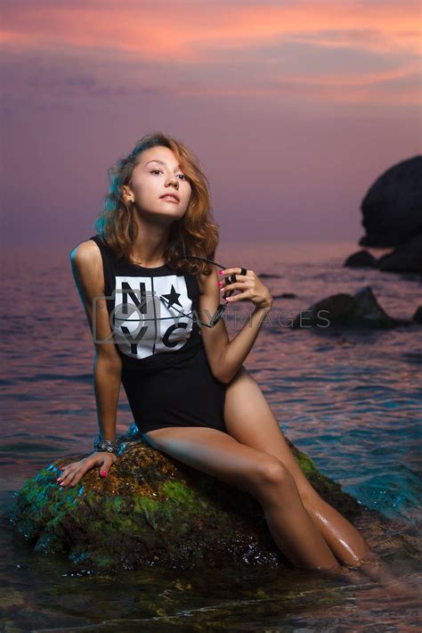 Teen Girl Sitting On Stone Fashion Shoot At Sunset Beach By Mrakor