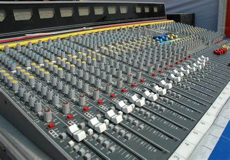 Premium Photo Audio Mixing Console In A Recording Studio Faders And